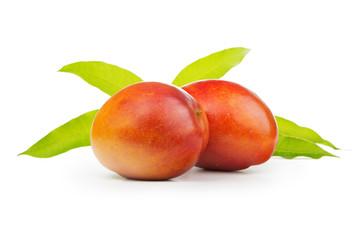 Ripe mango with leaves isolated white background