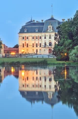 Deurstickers Castle in Pszczyna town in Poland. Beautiful antique neo baroque castle by evening. © shadowmoon30