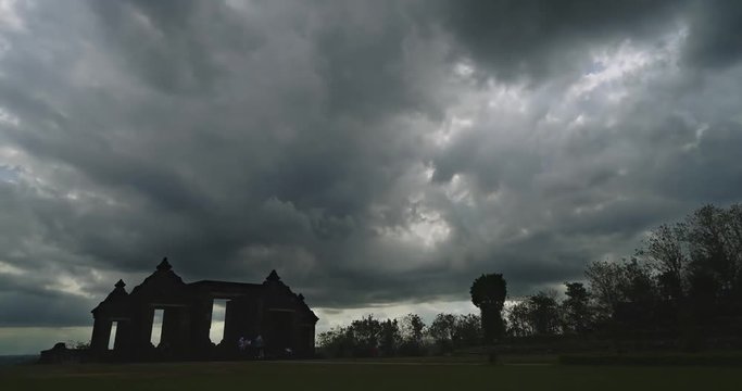 Beautiful landscape footage of cloudy sky above ruins Ratu Boko temple complex in Yogyakarta, Indonesia. Shot in 4k resolution