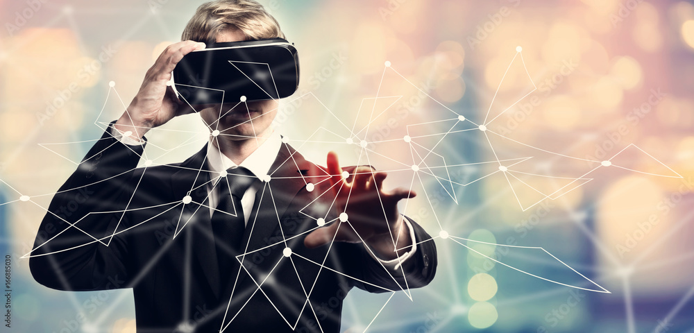 Poster links with businessman using a virtual reality