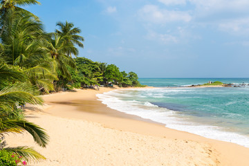 Obraz na płótnie Canvas The Pallikudawa beach in Tangalle in the southern province of Sri Lanka. The coastal town has a majestic bay and the most beautiful beaches in the south and south-east 