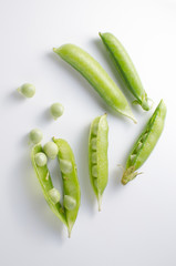 Green polka dots on a white surface