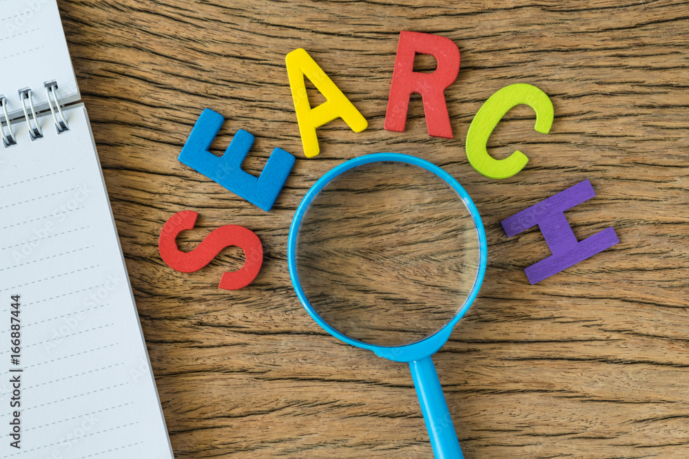 Poster seo search engine optimisation concept as colorful alphabet search with magnifying glass and note pa