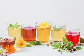 herbal tea in cups on a white background