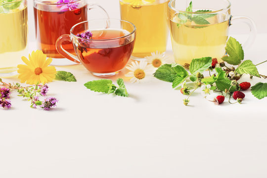 herbal tea in cups on a white background