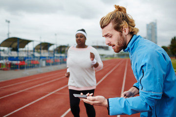 Weight-loss trainer measuring time of run