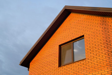 red brick wall fasade with window