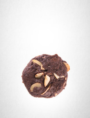 Cookies or Almonds chocolate cookies on background.