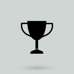 Trophy cup vector icon eps 10. Simple winner symbol. Black illustration isolated on grey background.