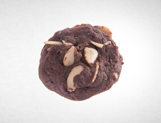 Cookies or Almonds chocolate cookies on background.