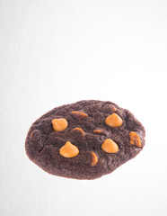 Cookies or Chocolate chips cookies on background.