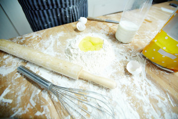 Ingredients for dough for bread on baker workplace