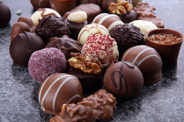 a lot of variety chocolate pralines, belgian confectionery gourmet chocolate