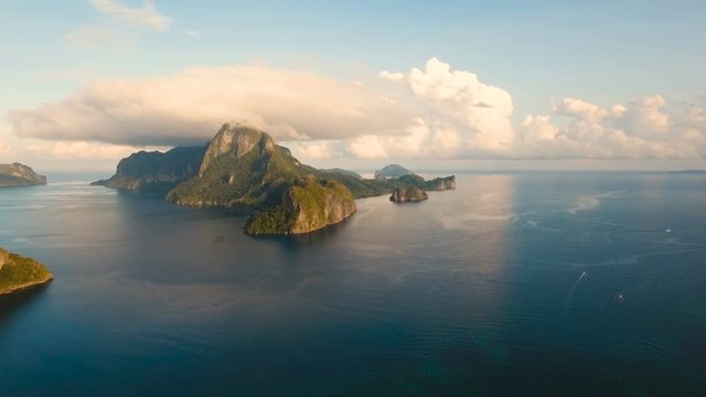 Tropical bay in El Nido.Aerial view: bay and the tropical islands. Tropical landscape.Sky and mountains rocks. Aerial video.Seascape: sky, mountains, ocean.Philippines, El Nido. 4K video. Travel