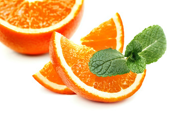 Fototapeta na wymiar orange, orange slices and mint leaves