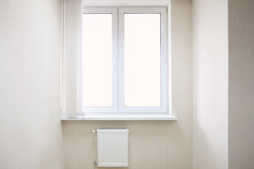 White metal-plastic window in modern apartment