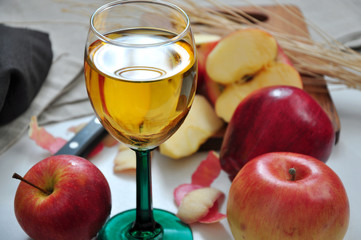 Close up Glass of Apple Juice with Fresh Red Apple