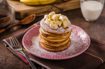 American pancakes with banana, chocolate