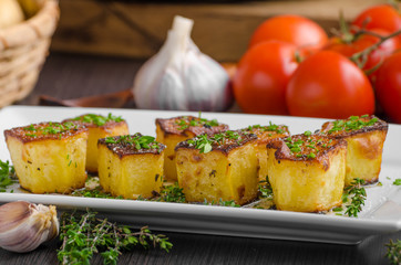 Potato fondant with garlic and herbs
