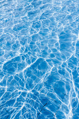 Surface of swimming pool water background
