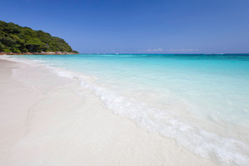 Beautiful tropical seascape of white sandy beach in Tachai island, Thailand.