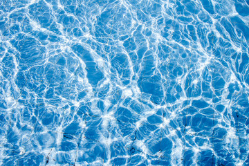 Surface of swimming pool water background