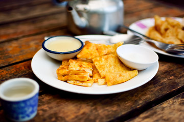 sweet roti on white plate