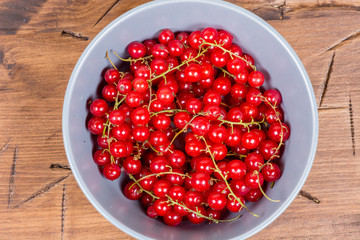 red currants on a wooden