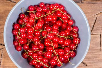red currants on a wooden