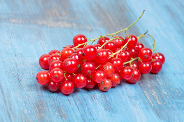 red currants on a wooden