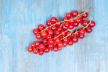 red currants on a wooden
