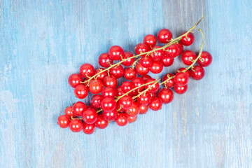 red currants on a wooden