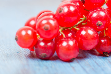 red currants on a wooden