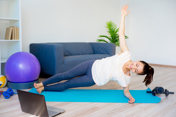 Girl is doing fitness at home