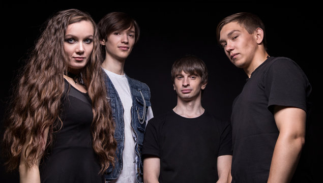 Young rock musicians - woman and men