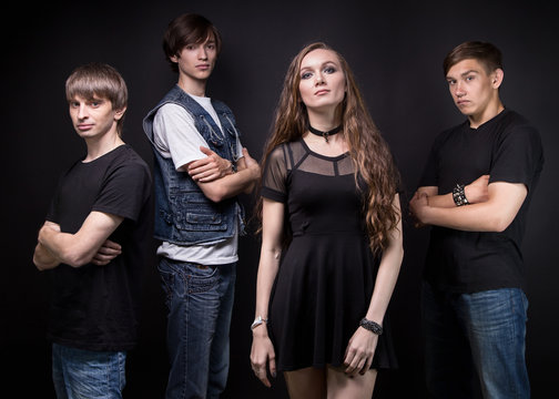 Photo of rock band - woman and three men