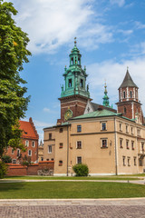 Fototapeta na wymiar fortified architectural complex with Wawel cathedral on a sunny day with blue sky