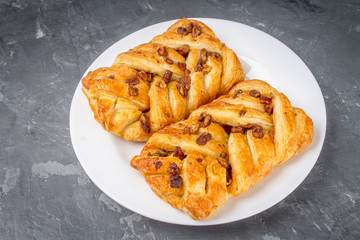 Danish pastry maple pecan with nuts and maple syrup