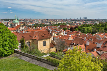 Fototapeta na wymiar Tiled roofs of Prague, view of the city