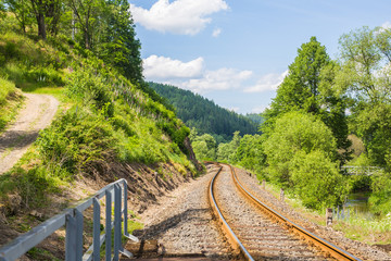 Obraz premium Railroad travel, railway tourism. Industrial concept background. Transportation