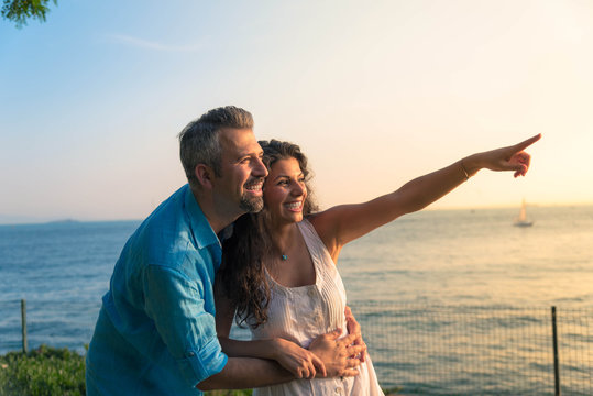 Woman pointing with her husband