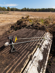Trailer delivering soil and plants for composting