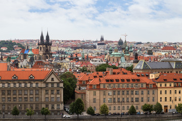 View of buildings at the Old Town and beyond in Prague, Czech Republic in the daytime.