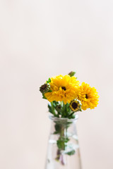 flowers in vase on the street cafe