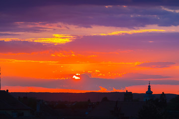Naklejka na ściany i meble Awesome scenery of sunset over the ancient european city Sibiu in Romania