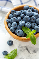 Ripe blueberries in a bowl.