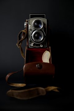 Vintage twin lens reflex camera, dark background