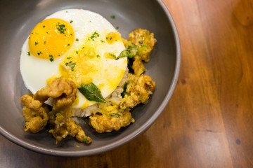 Butter rice with salted chicken crisp and fried egg