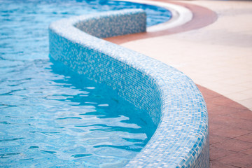 Beautiful curved edge of a swimming pool