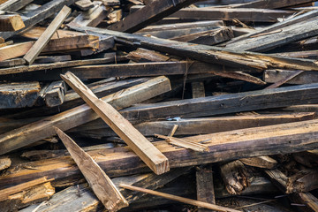 bunch of old boards after the Demolishing  of the structure